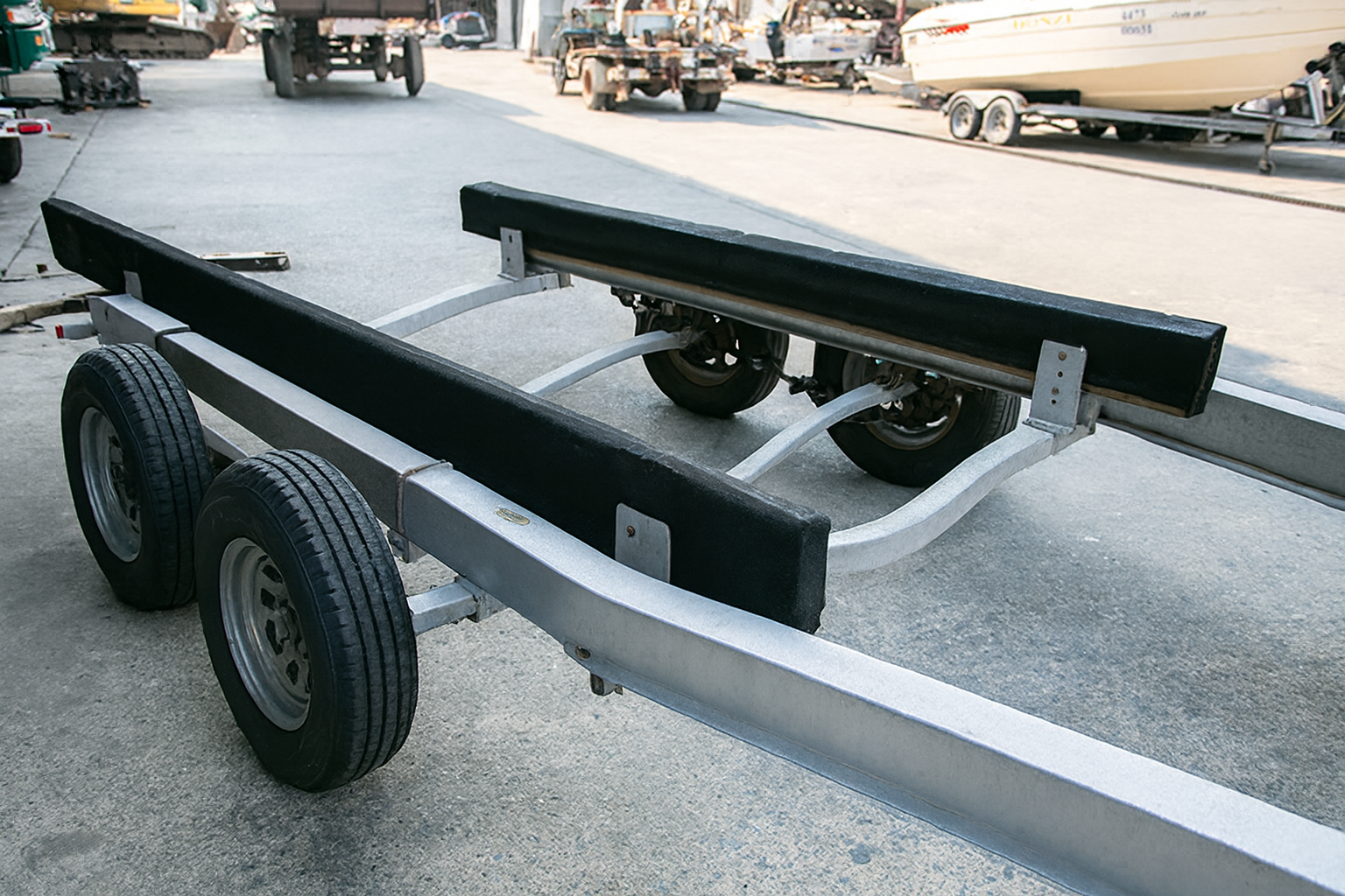Boat trailer by the water